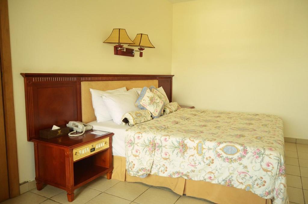 Mensvic Grand Hotel Acra Habitación foto