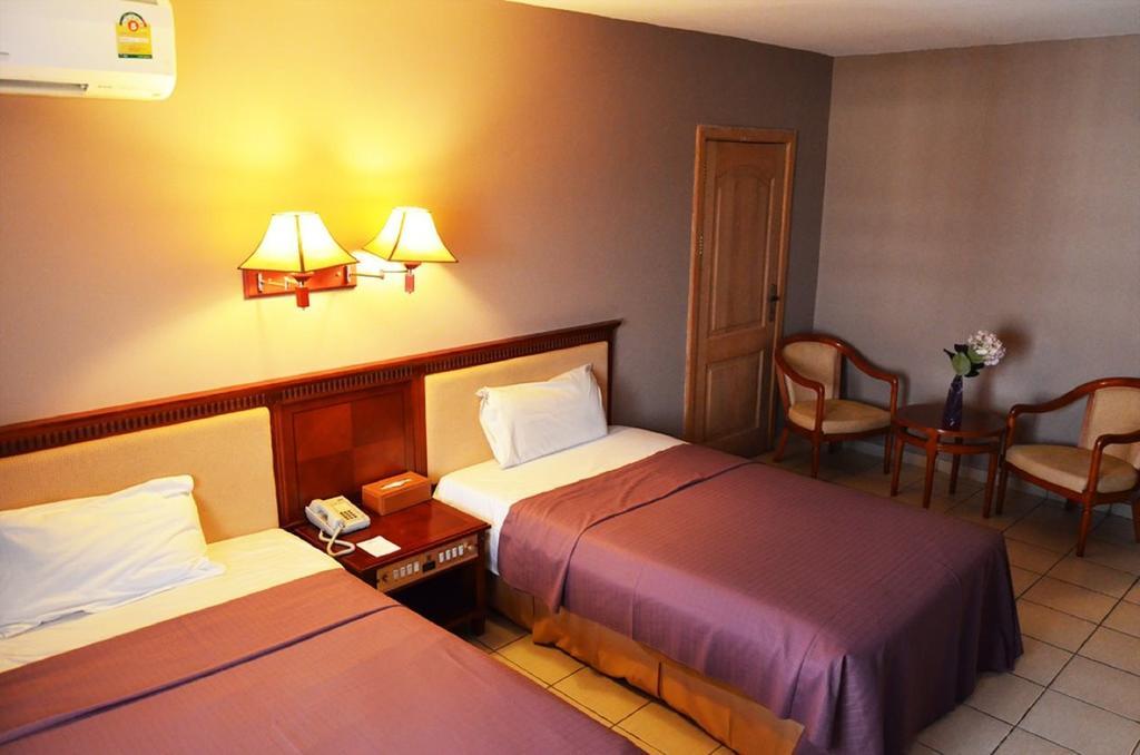 Mensvic Grand Hotel Acra Habitación foto